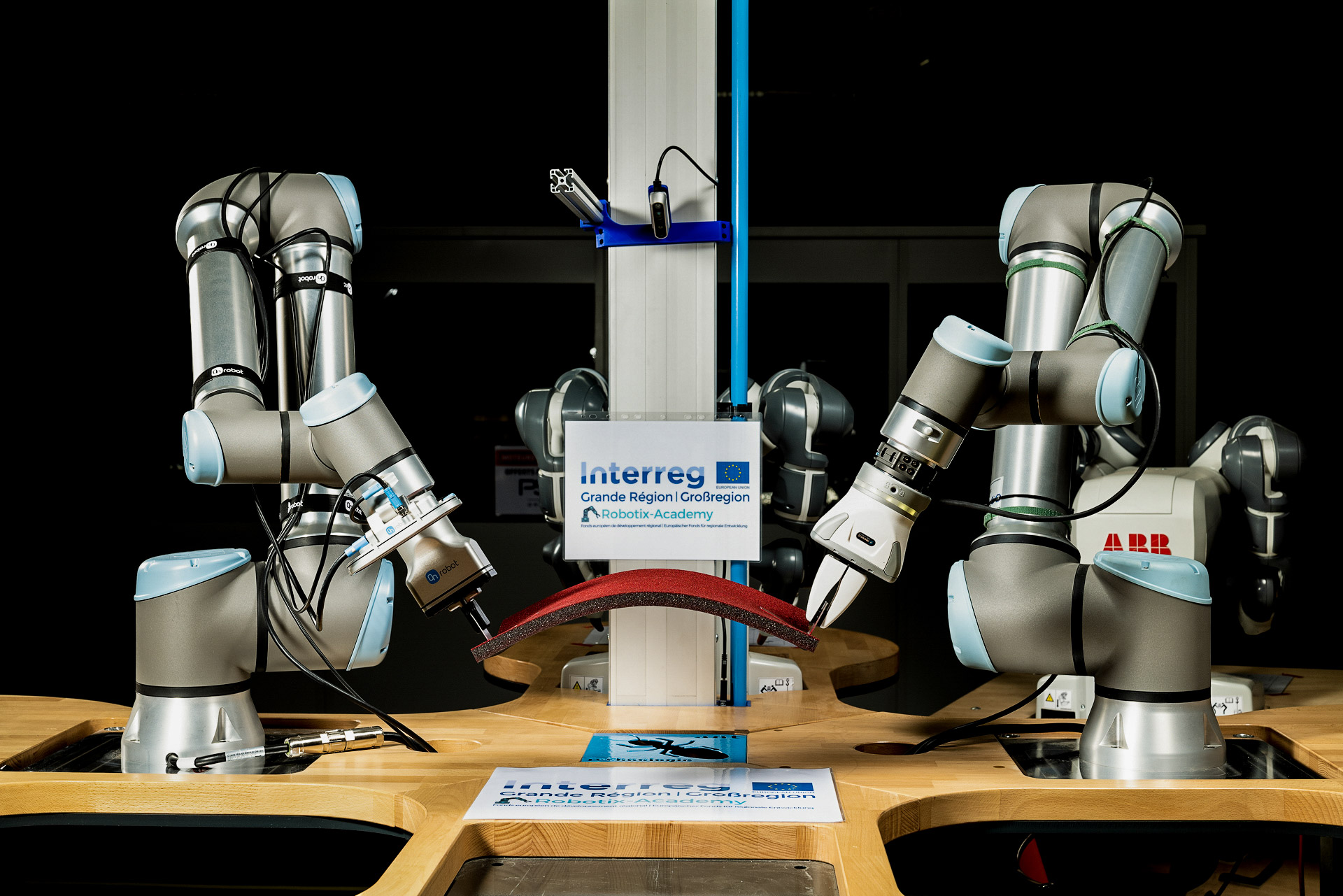 A robot cell comprised of two UR10e collaborative robots and a vision system